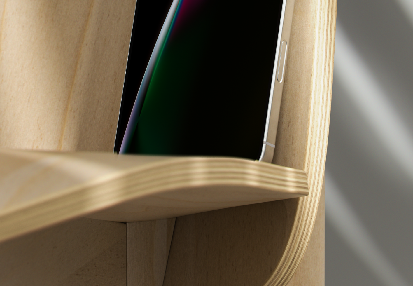 Close-up of a modern smartphone holder made from wood, showcasing sleek design and craftsmanship. Ideal for product mockups or design presentations.