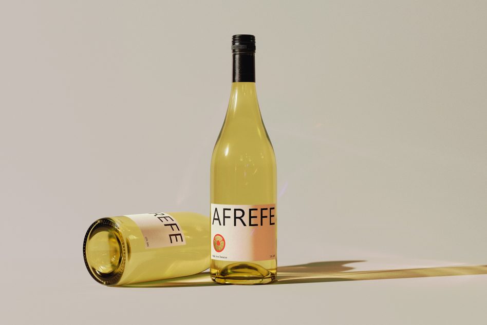 White wine bottle mockup with one upright, one laying down, clean minimalist setup