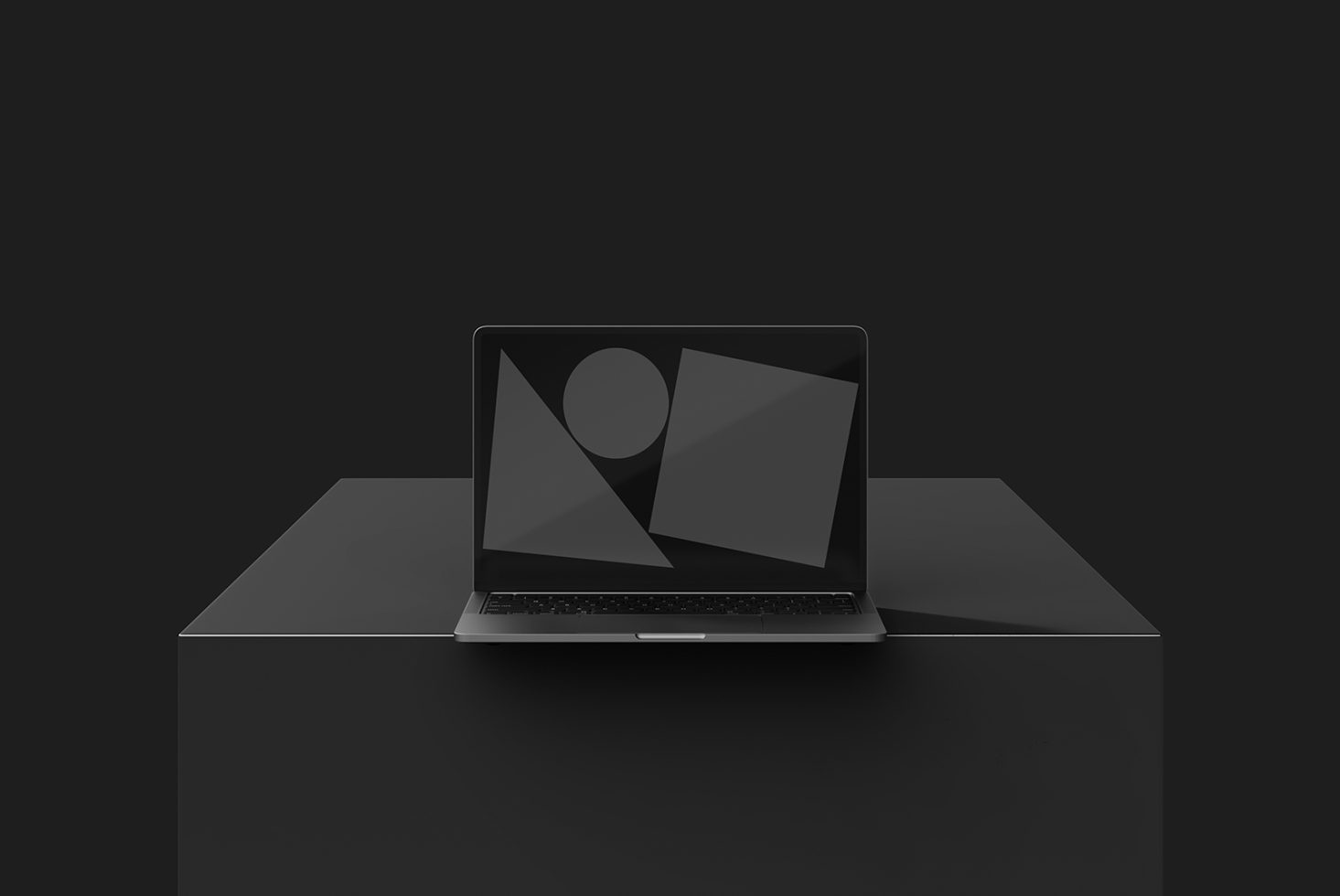 Minimalist laptop mockup on a dark background displaying geometric shapes ideal for designers digital assets templates graphics modern aesthetic SEO