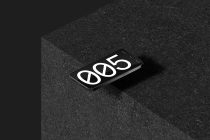Isometric phone mockup displaying white 005 numerals
