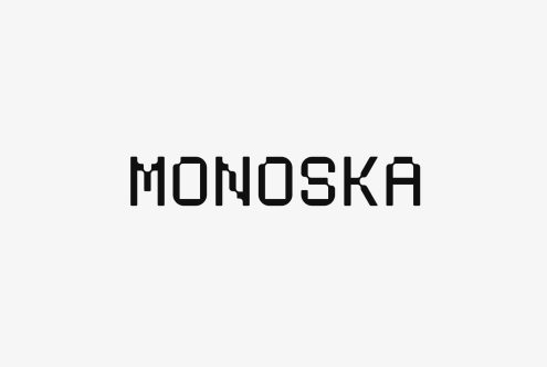 Monoska font in black uppercase letters on a light gray background digital typography asset for designers font design graphic template typography mockup