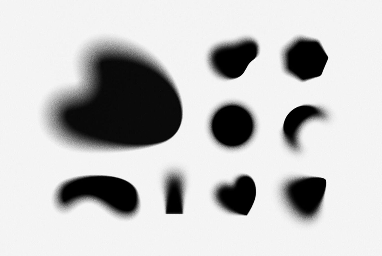 Blurry organic shapes in black with soft edges, hearts, blobs, curved forms on white