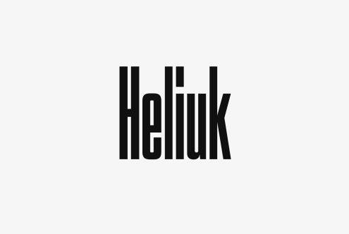 Modern tall black font on a light gray background spelling Heliuk. Ideal for designers seeking bold, minimalist typography. Perfect for mockups, graphics, templates.