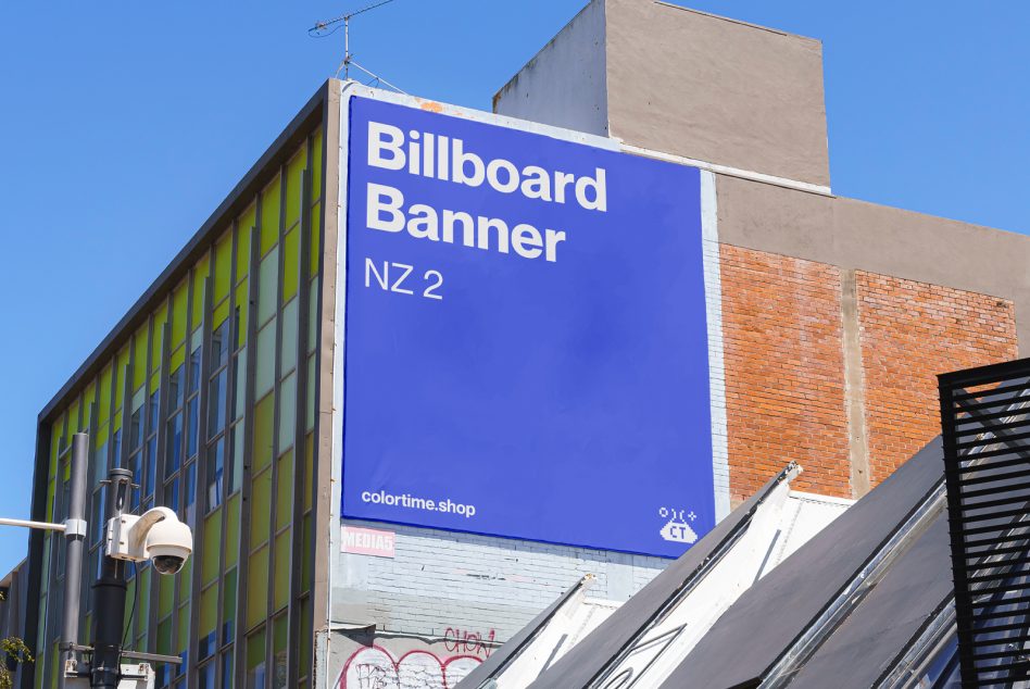 Large blue billboard mockup on urban building wall great for showcasing graphic design ads templates ideal for designers seeking realistic outdoor displays