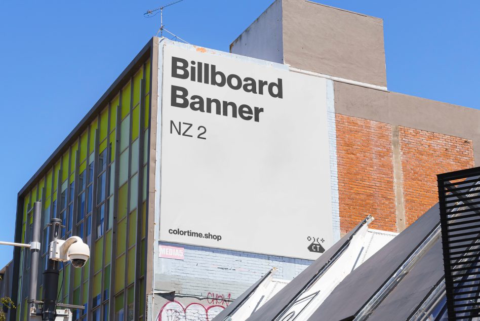 Urban billboard mockup on a colorful building under blue sky ideal for advertising presentations marketing campaigns design projects SEO keywords graphics templates.