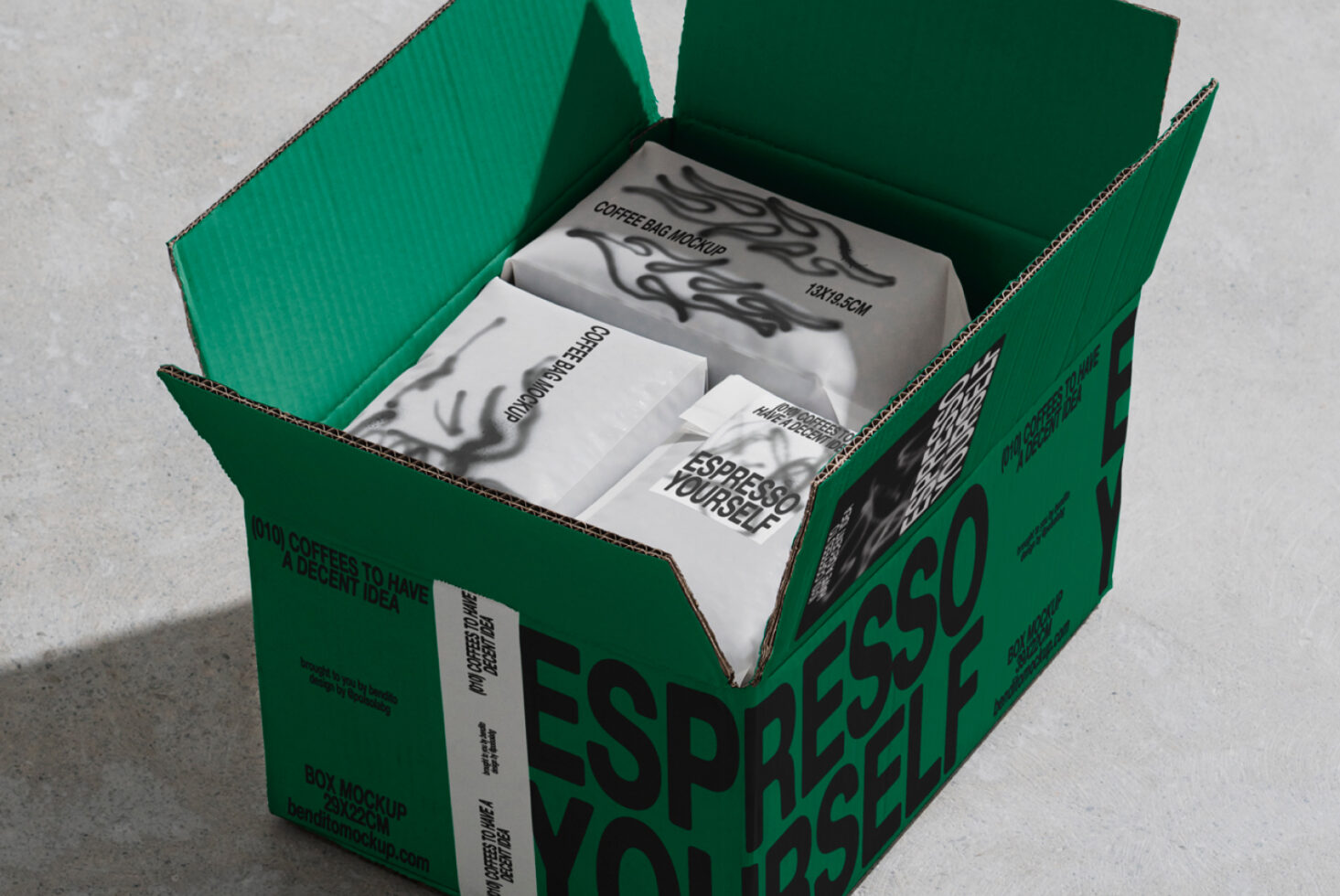 Coffee bag and box mockup in green open box. Perfect for branding designers. Keywords: mockup, packaging, coffee, branding, design asset, template.