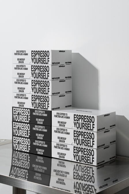 White coffee box mockup stack with black box variations showing multiple angles