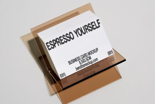 Business card mockup design featuring cards with Espresso Yourself text on a transparent holder. Ideal for designers. Keywords: mockup, business card.