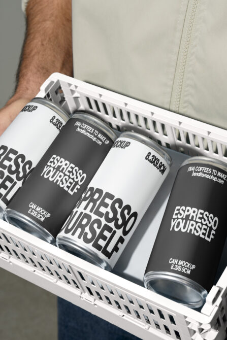 Mockup image of coffee cans with bold typography in a white crate. Perfect for designers seeking beverage packaging inspiration and realistic mockups.