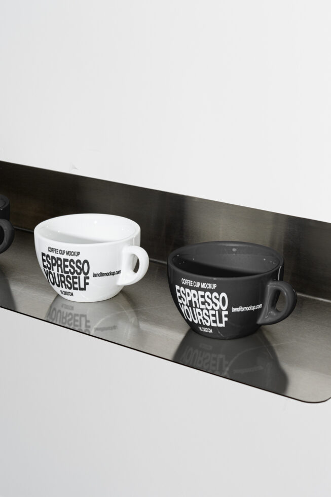 Coffee cup mockup featuring black and white espresso cups on a reflective surface perfect for designers looking for branding and presentation templates.