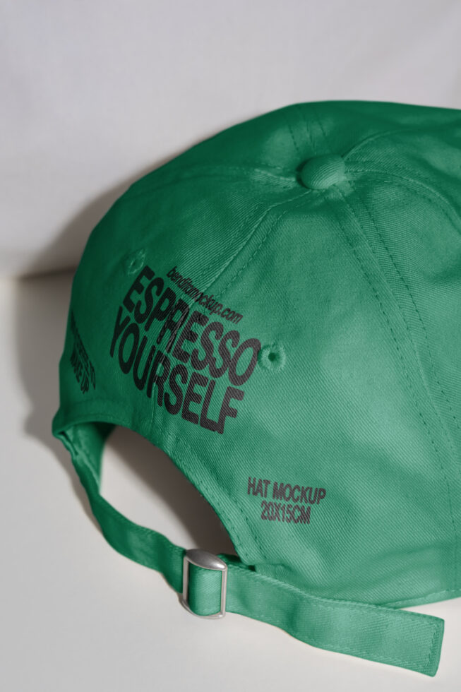 Green baseball cap mockup for designers with text Espresso Yourself showcasing logo design and branding potential; ideal for mockups and graphic projects.