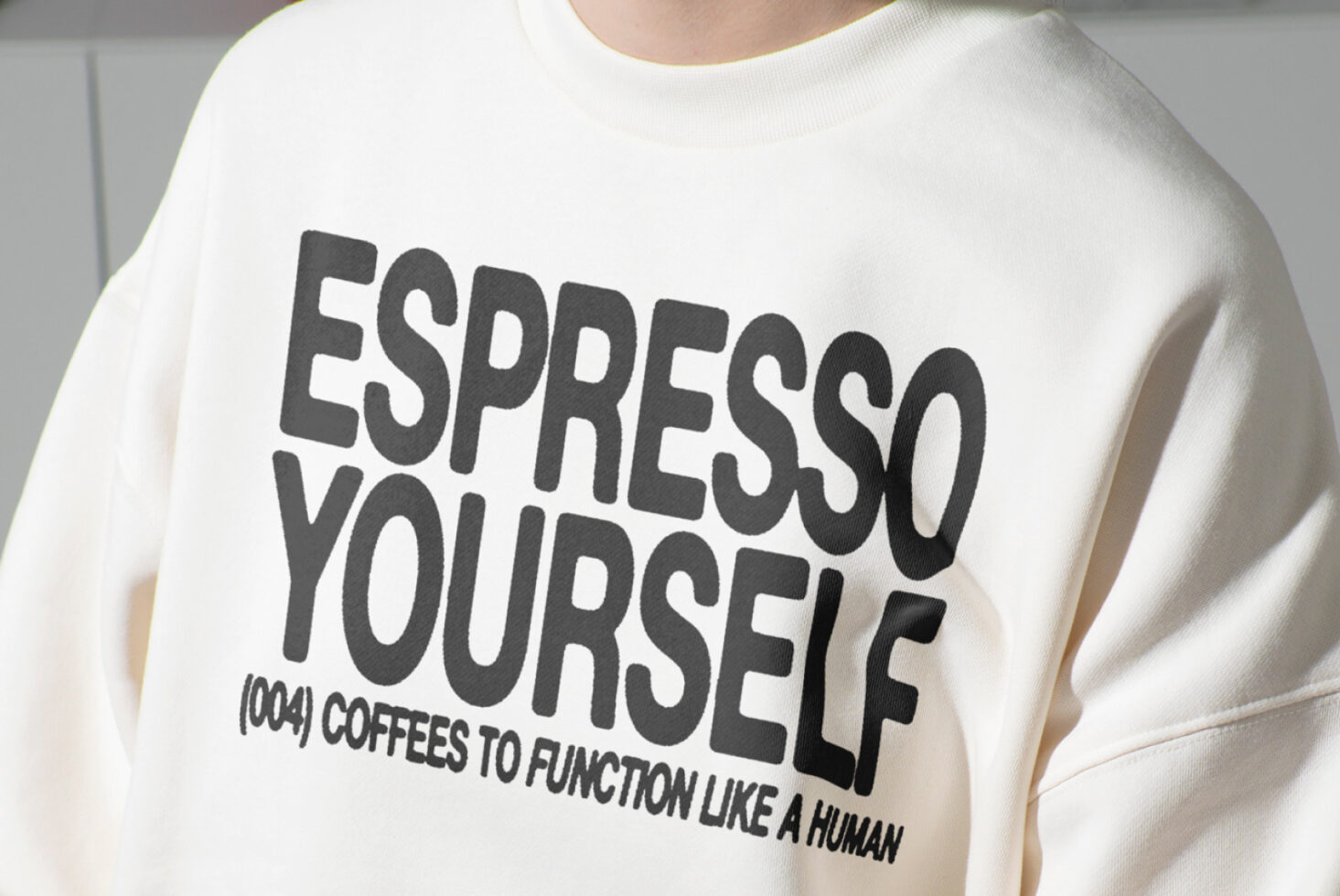 Sweatshirt with bold 'Espresso Yourself' text design stylish mockup. Ideal for designers seeking unique typography graphics and creative fashion templates.