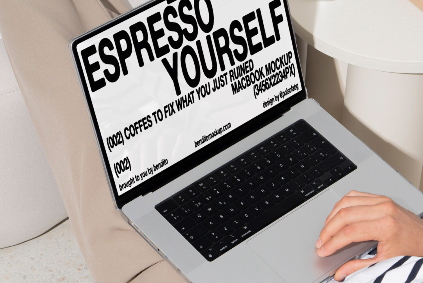 Mockup of a MacBook with a creative espresso-themed display on the screen. Ideal for designers seeking tech-related templates or showcasing digital designs.