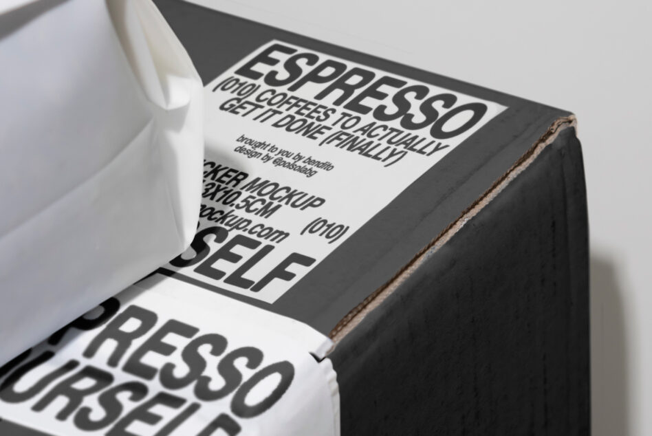 Close-up of a black package with a white sticker mockup featuring bold text. Ideal for designers seeking custom packaging templates for coffee branding.