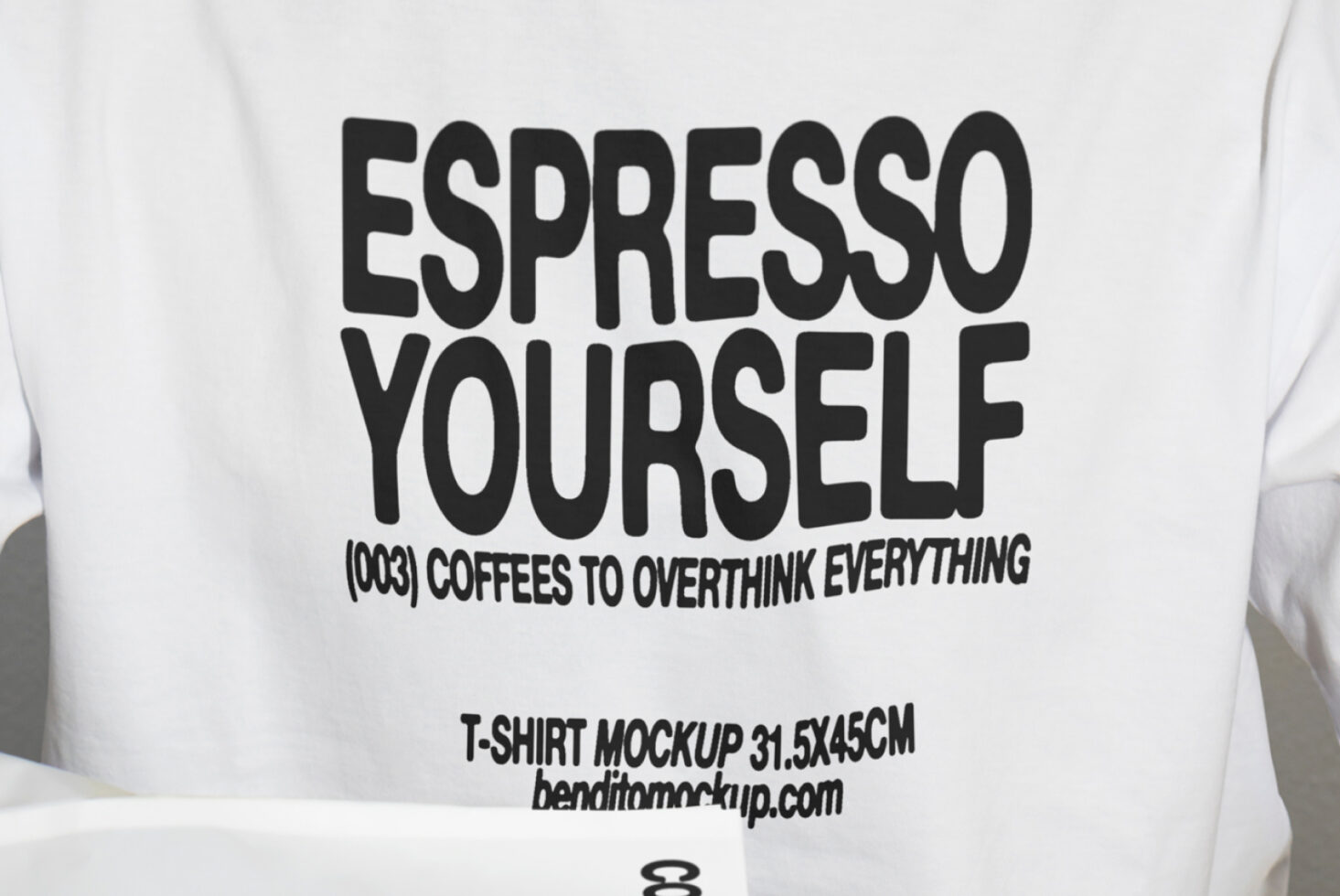 Mockup of a white t-shirt featuring bold black typography design Espresso Yourself suitable for graphic design projects brand presentation