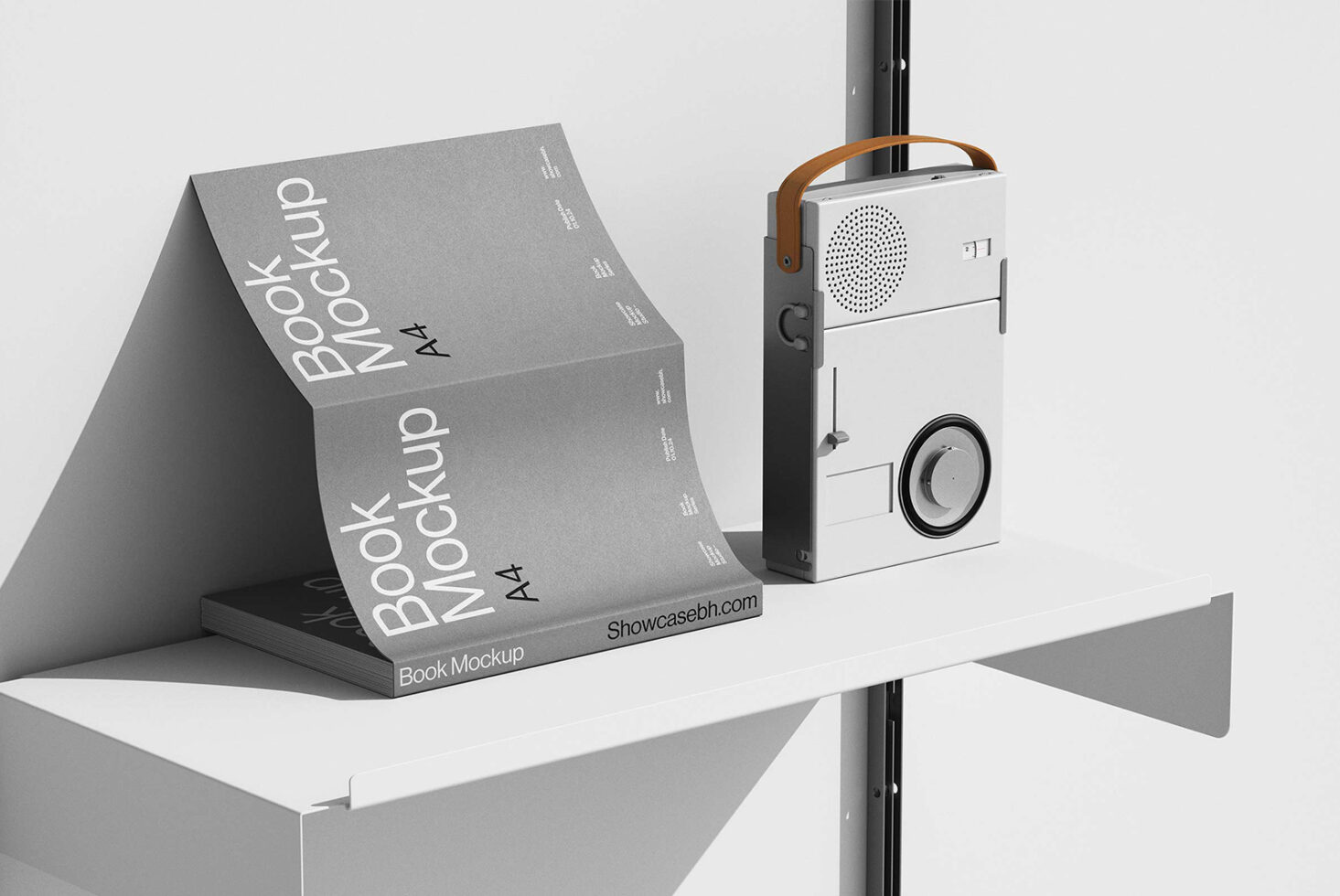 A4 book mockup on white shelf next to a retro portable radio. Ideal for designers seeking minimalistic presentation templates and graphics mockups.