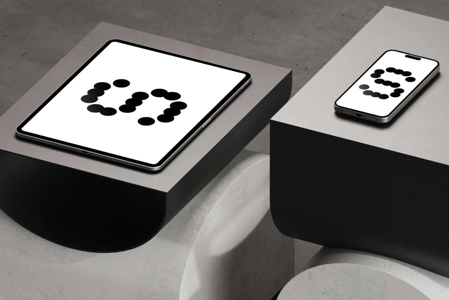 Tablet and smartphone mockup on modern geometric stands in minimalistic setting showcasing digital typography design for designers. Keywords: mockups, design.