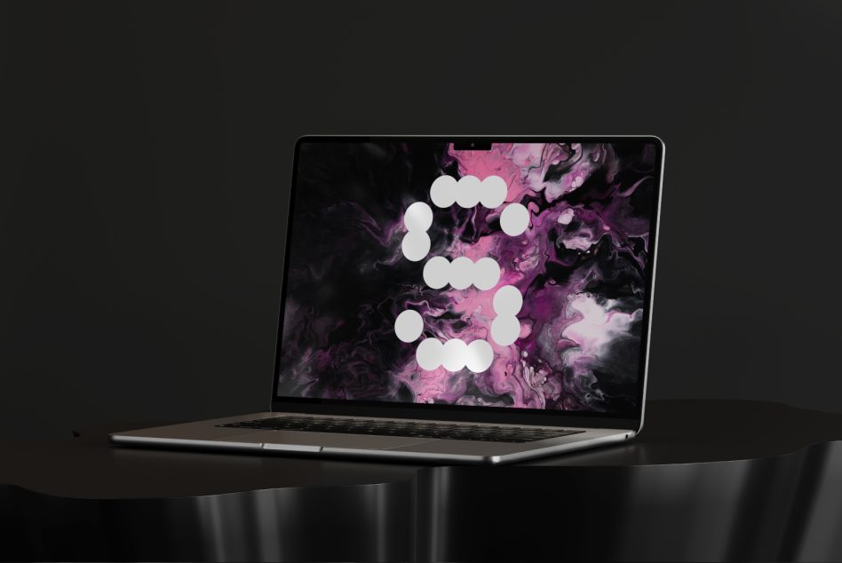 Laptop mockup with abstract pink and black swirling background. Ideal for digital design projects. Keywords: mockups, digital assets, designers.