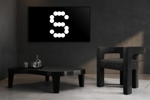 Minimalist interior mockup featuring modern furniture with abstract wall art displaying the number 5. Ideal for designers seeking sleek room templates.