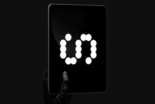 Futuristic digital tablet mockup featuring abstract circular graphic held by robotic hand on black background suitable for designers and creatives.