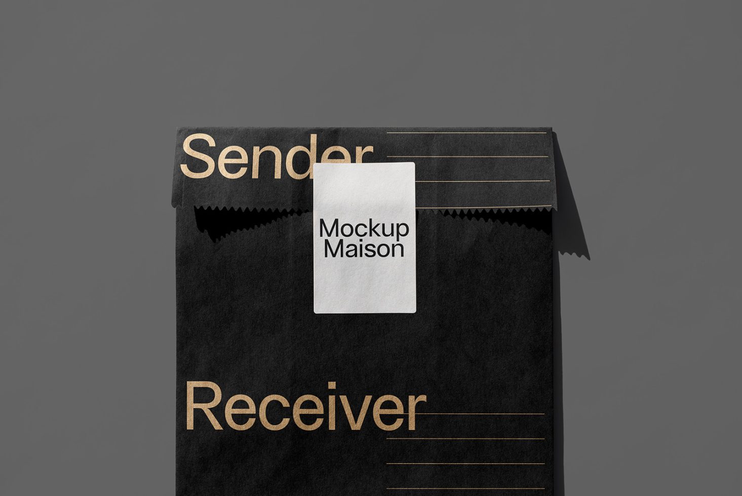 Black envelope mockup with sender and receiver text in gold font. White label with Mockup Maison text. Perfect for graphic designers. High-quality template.