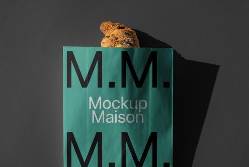 Green paper bag mockup with the text Mockup Maison. Ideal for branding clothing packaging design realistic mockup. Designer resource digital asset.