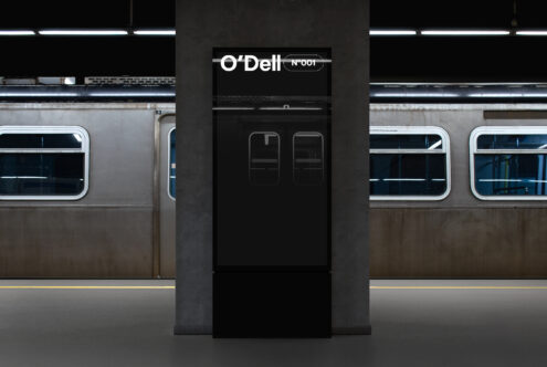 Subway station mockup featuring an advertisement board on a concrete pillar with a train in the background suitable for designers seeking realistic graphics.