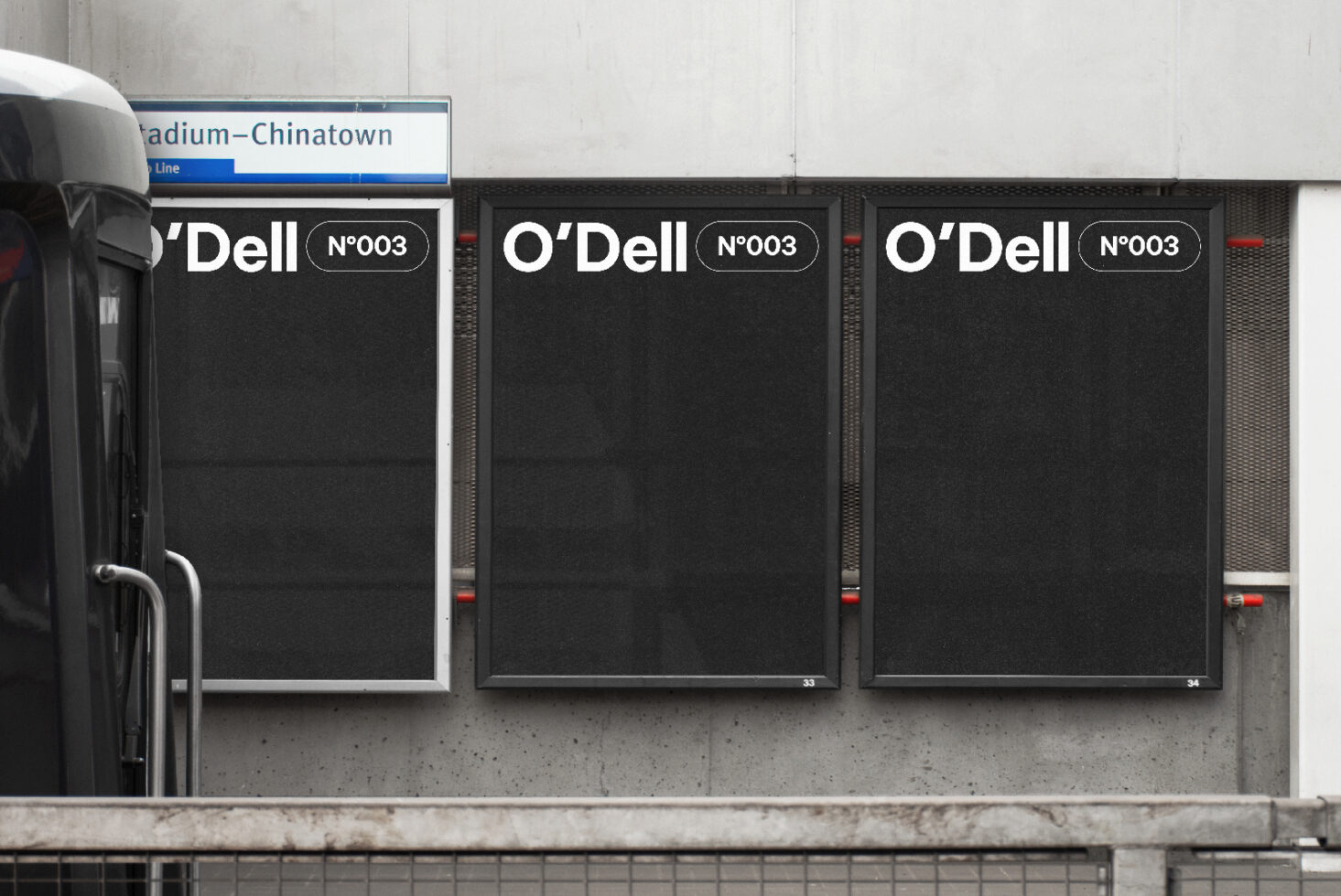 Subway station billboard mockup featuring three black posters with bold white text O'Dell No003 ideal for designers marketing urban advertising graphics.