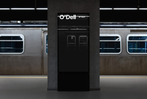 Subway station poster mockup featuring a modern, dark design on a concrete pillar. Perfect for designers searching for realistic urban templates.