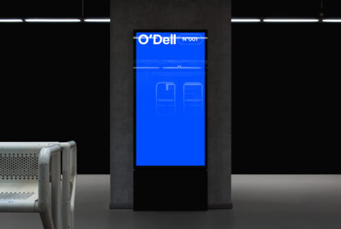 Digital poster mockup in a subway station, featuring bold typography on a blue background. Ideal for designers creating advertising displays.