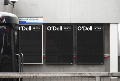 Urban billboard mockup at station platform with three large posters labeled ODell and minimalist design ideal for showcasing graphic design templates