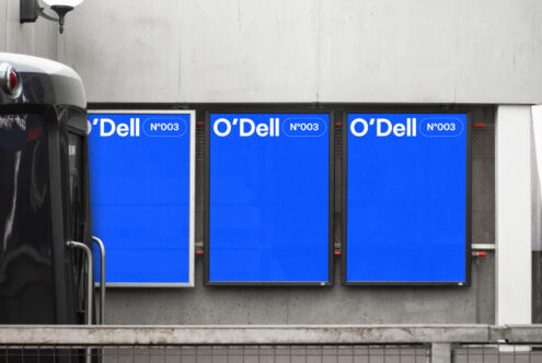 Three blue billboard mockups with bold white text on a concrete wall. Perfect for showcasing branding concepts, promotional graphics, urban design.