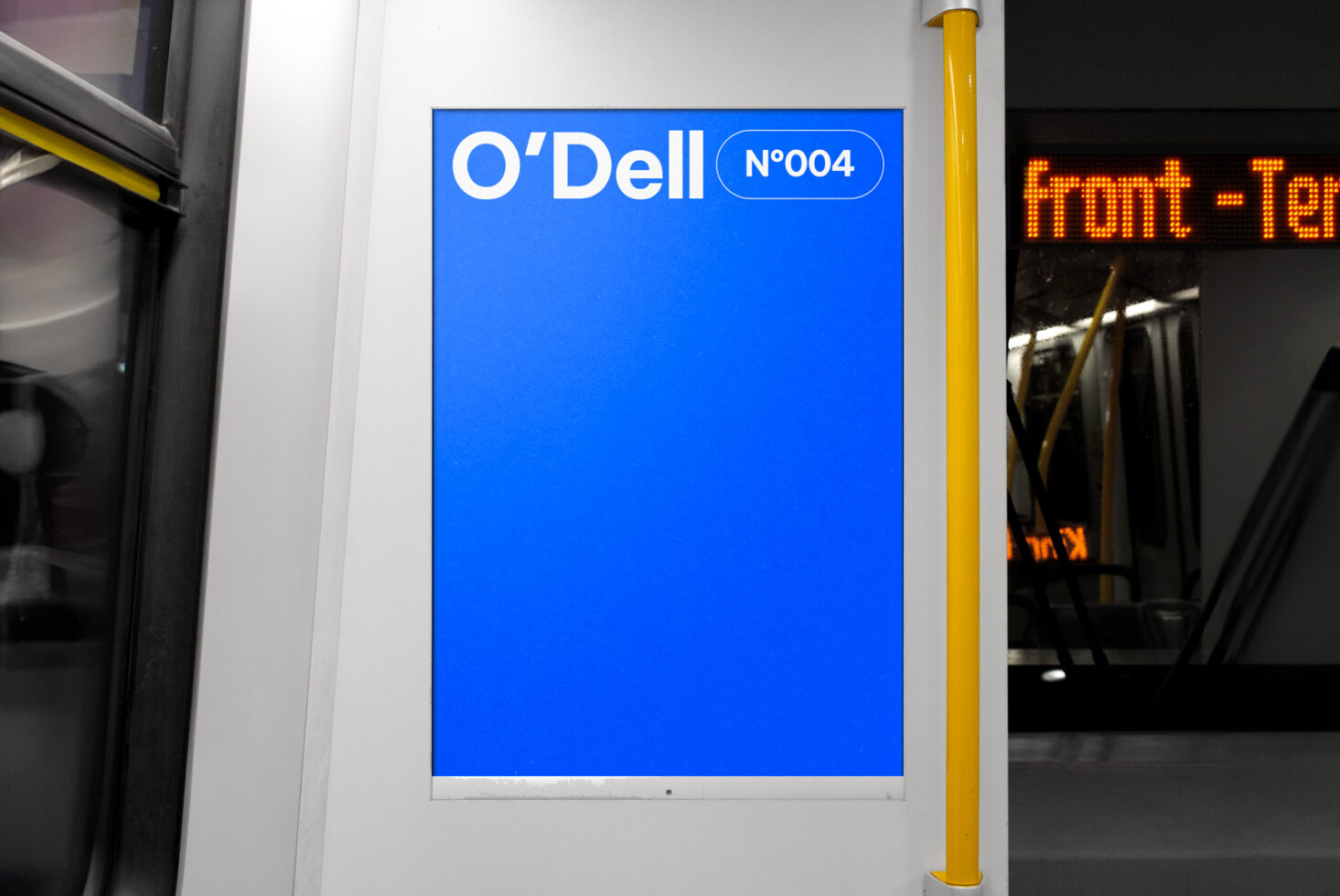 Blue poster mockup on subway with O'Dell branding display. Perfect for graphic designers needing realistic presentation templates. Urban transit interior.