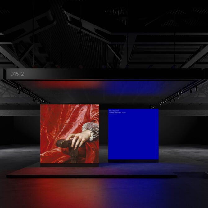 Dual monitor setup mockup with red classical art on left screen, bright blue on right in industrial space