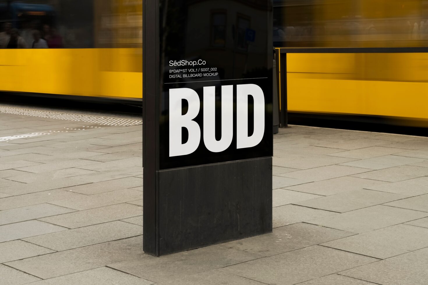 Digital billboard mockup in urban setting featuring bold text BUD on black background. Ideal for designers creating advertisement templates or graphic assets.