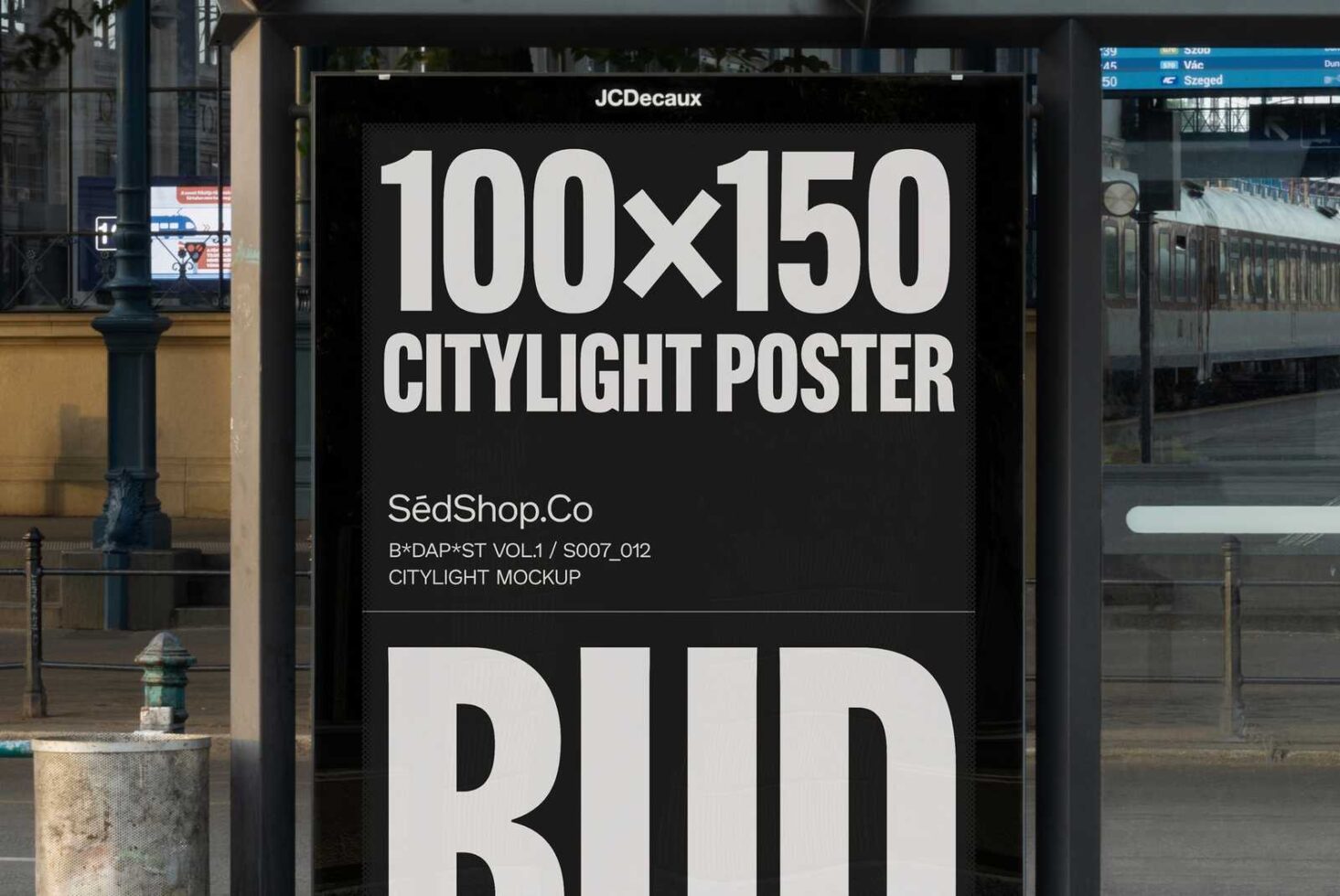 Citylight poster mockup displayed outdoors with train station background. Ideal for designers seeking realistic advertising presentations. Mockups graphics.