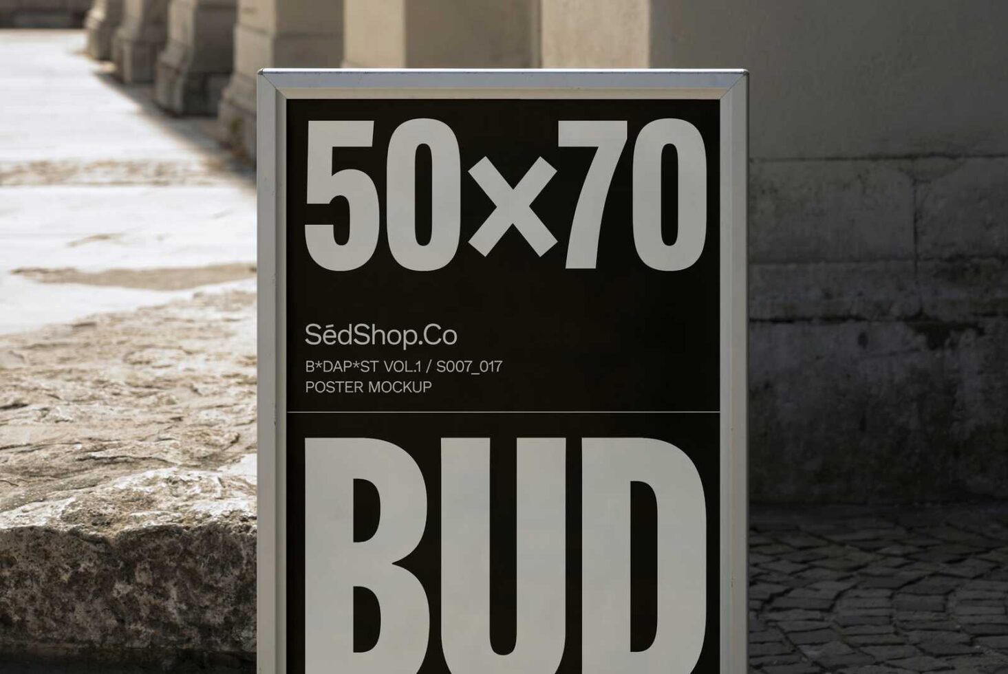 50x70 poster mockup displayed outdoors in urban setting suitable for graphic designers product presentations and advertising design projects.