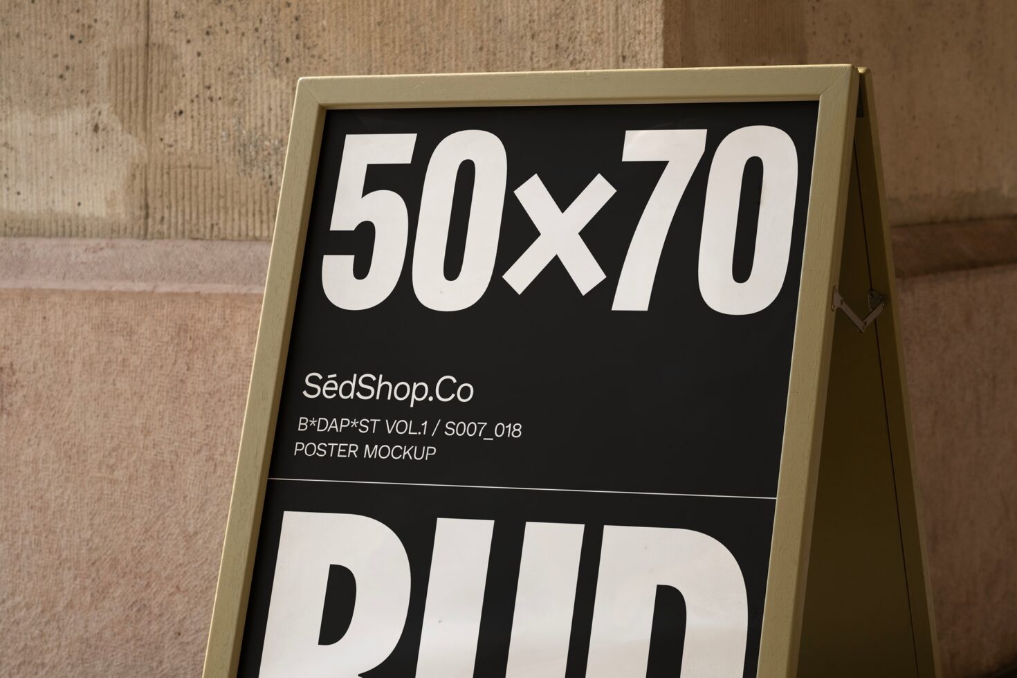 A-frame sign with 50x70 poster mockup in urban setting perfect for showcasing graphic design templates to designers seeking professional presentation tools.