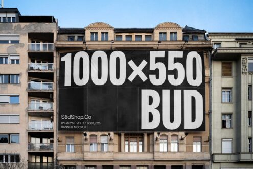 Urban banner mockup on a building facade with large dimensions 1000x550. Ideal for showcasing advertising designs. Keywords: mockup urban design banner.