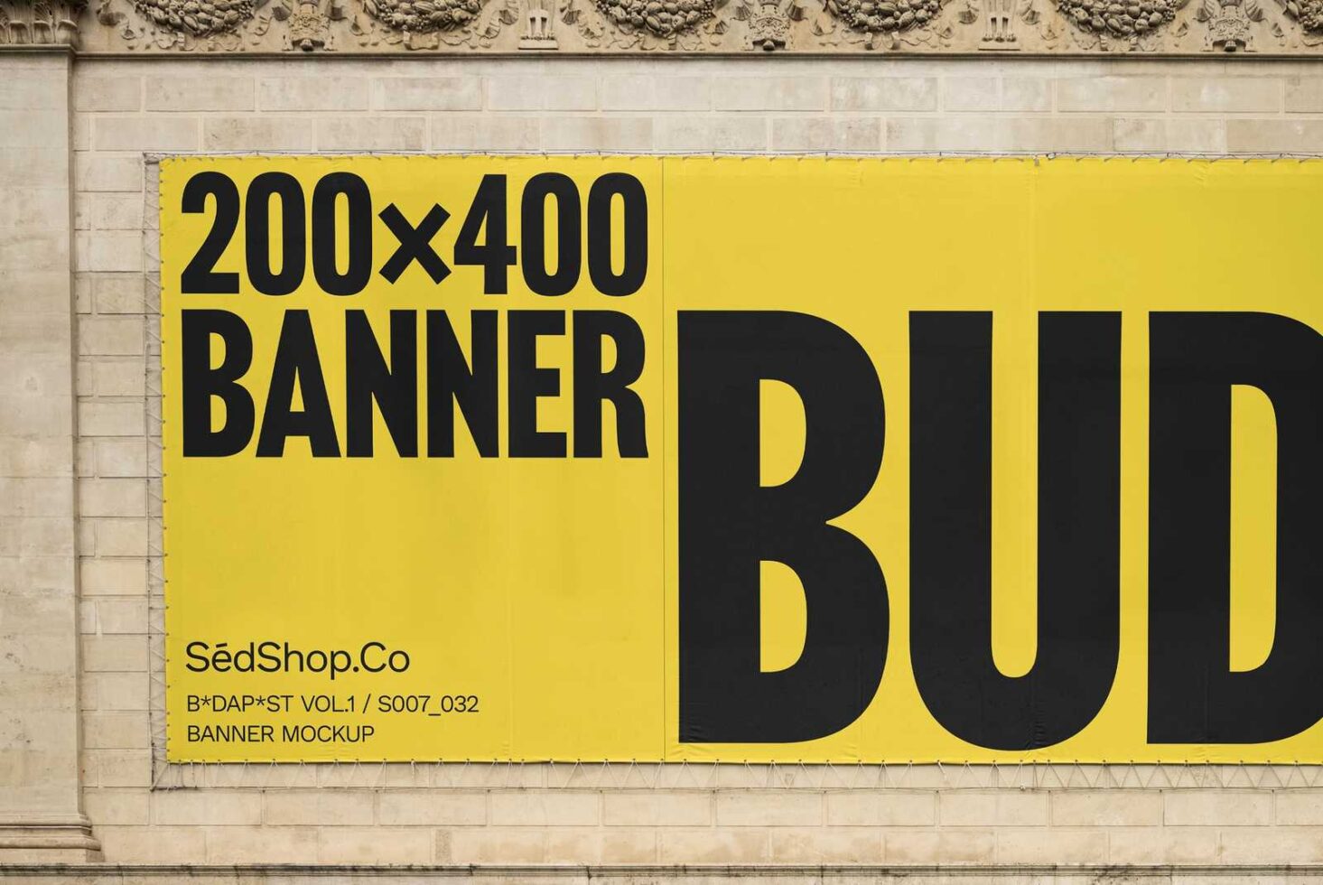 Yellow 200x400 banner mockup on stone wall for templates and design showcasing. Ideal for designers seeking realistic presentation and advertising visuals.