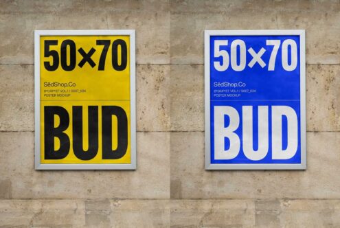 Two side-by-side framed poster mockups on a textured wall. One poster is yellow with black text; the other is blue with white text. Ideal for designers.