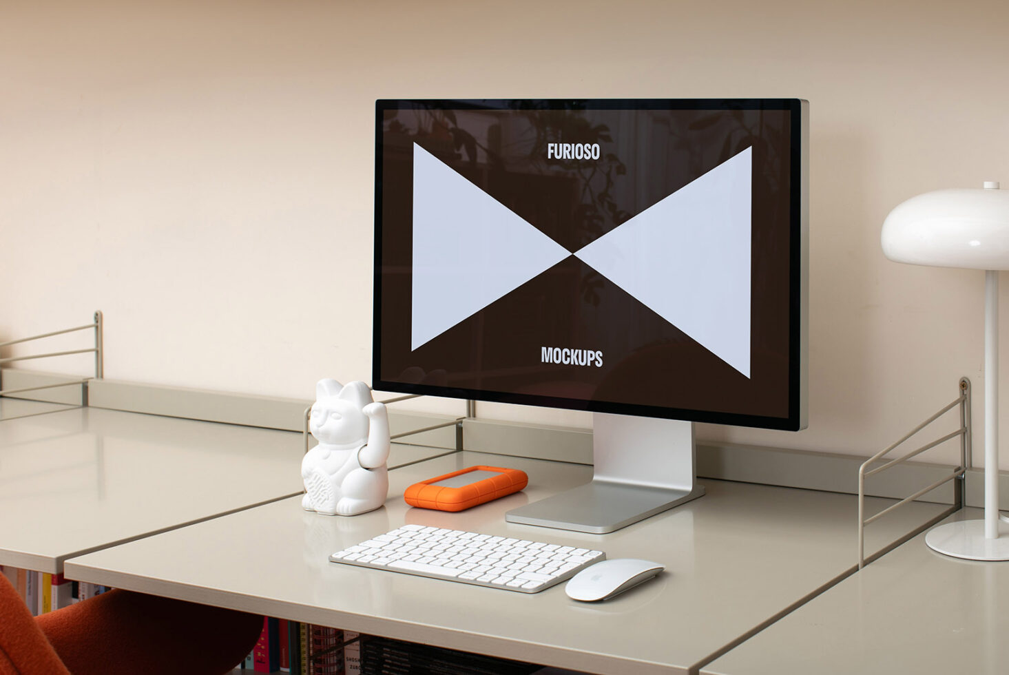 Desktop monitor displaying Furioso Mockups design workspace with keyboard and mouse. Ideal for showcasing digital assets for designers. Mockup resource.