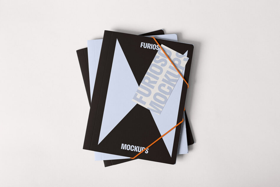 Stack of modern mockup books with bold geometric design on white background ideal for designers seeking high-quality presentation templates.