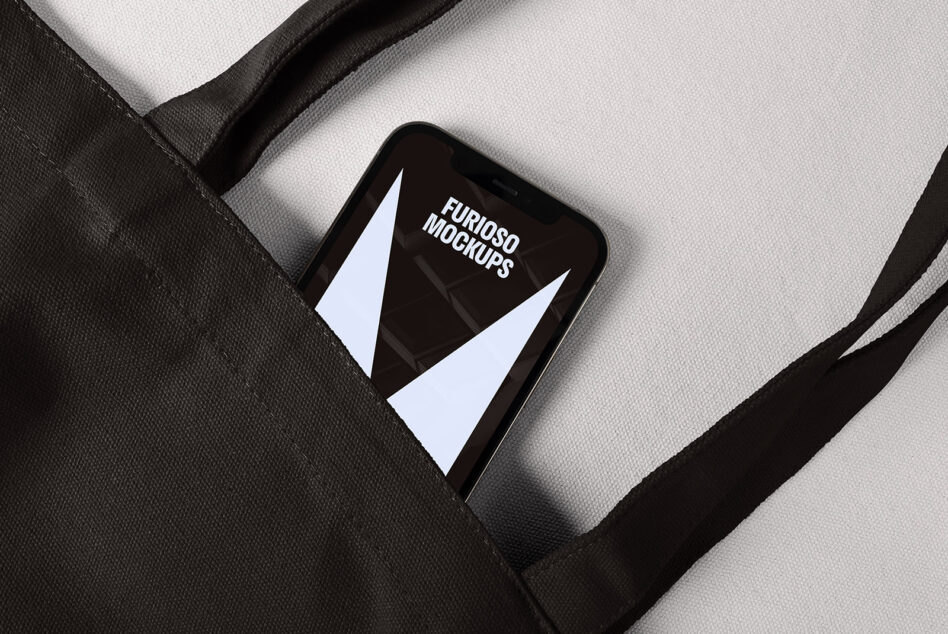 Phone in tote bag mockup for designers tote bag design smartphone screen template creative digital asset minimalist display branding showcase