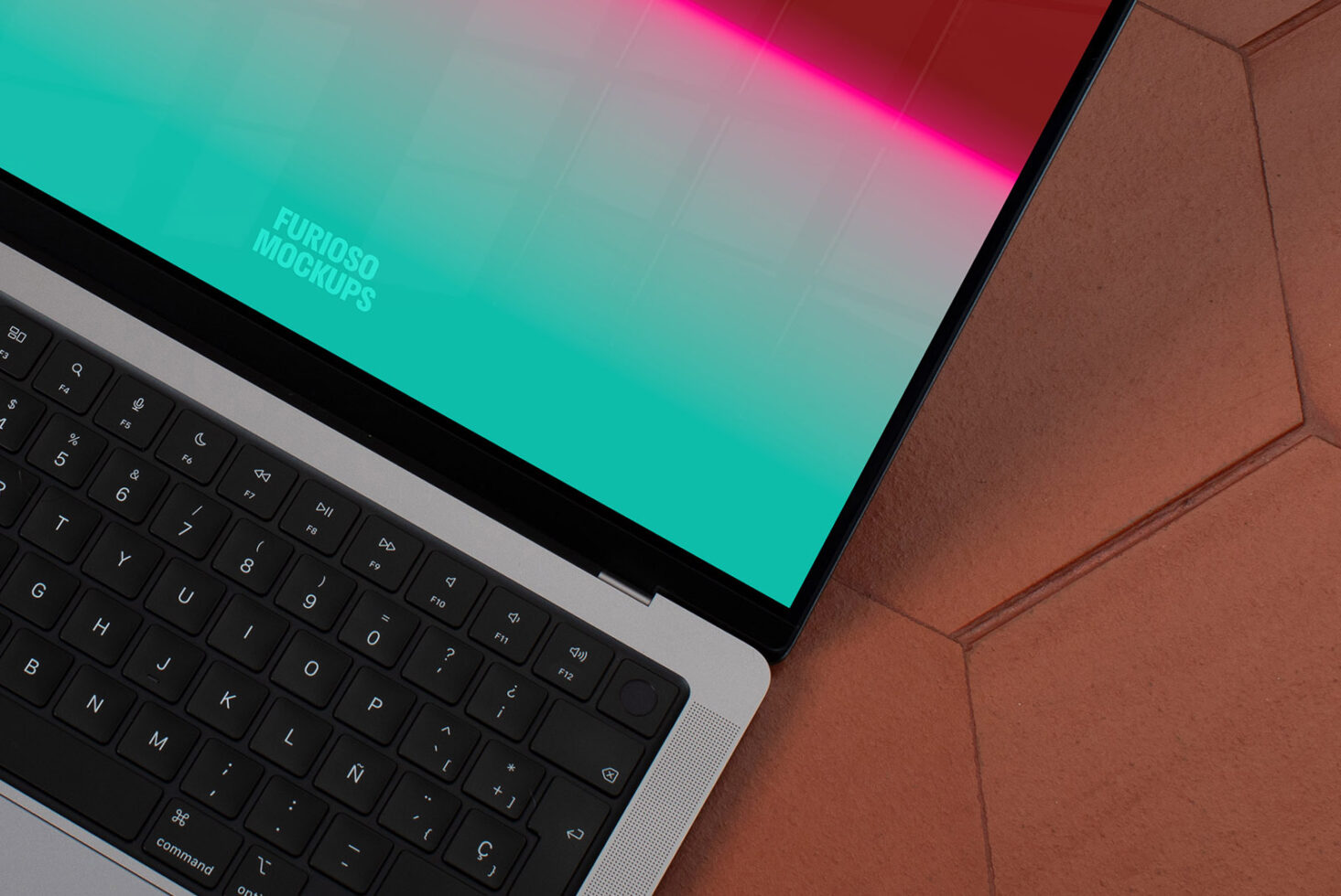 Laptop mockup showcasing a vibrant gradient screen with a close-up of a keyboard on a textured surface. Ideal for designers seeking realistic device visuals.