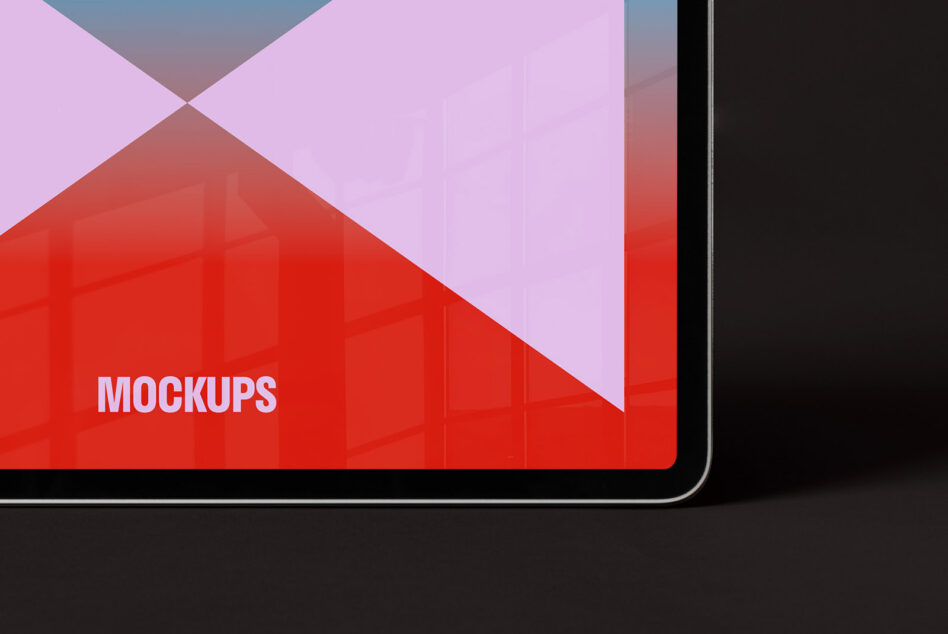 Tablet screen displaying colorful geometric design with text Mockups. Ideal for designers seeking digital assets, templates, and graphic resources.