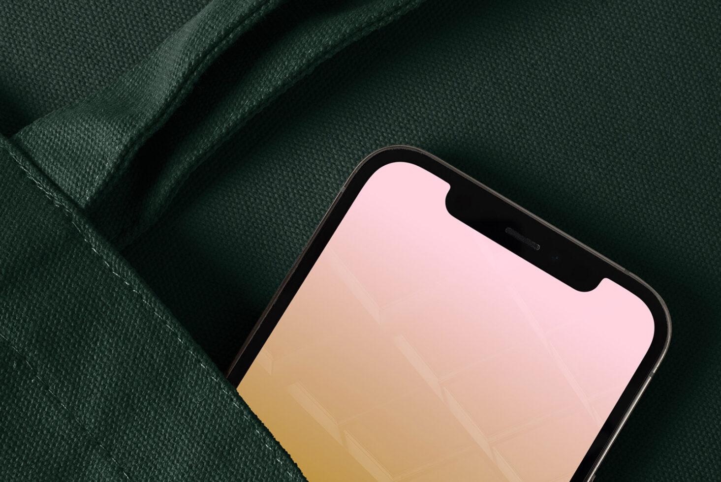 Smartphone in green fabric bag mockup featuring a pink gradient screen. Ideal for showcasing app designs or digital products. Perfect for designers.