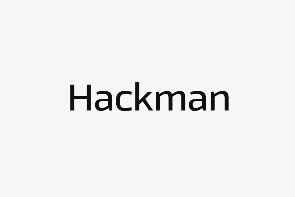 Bold 'Hackman' typography on light background perfect for designers. Ideal for digital assets, fonts, and graphic designs. Sleek modern sans-serif.