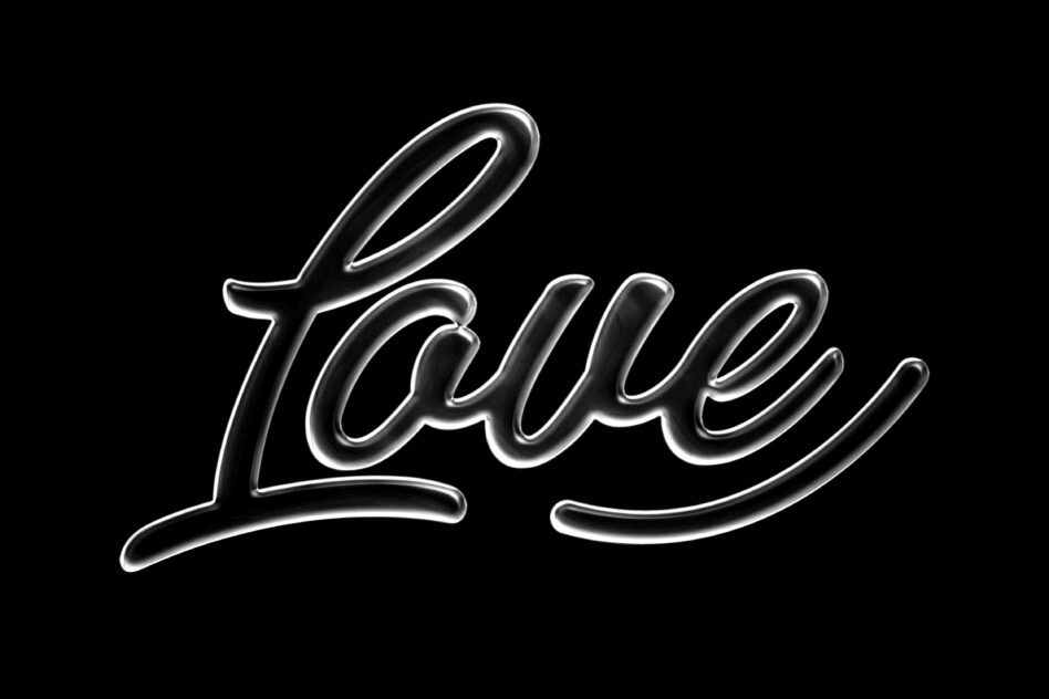 Silver cursive script text spelling Loved with glowing outline effect on black