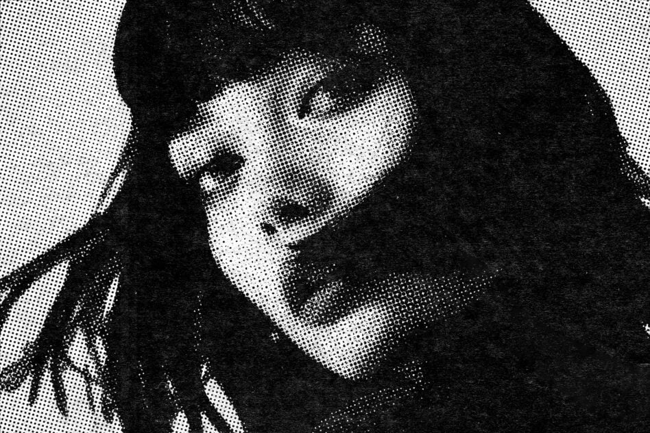 Woman's face with halftone pattern, diagonal composition, high contrast black white